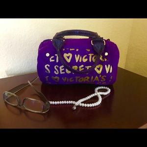 Victoria’s Secret purple roll bag